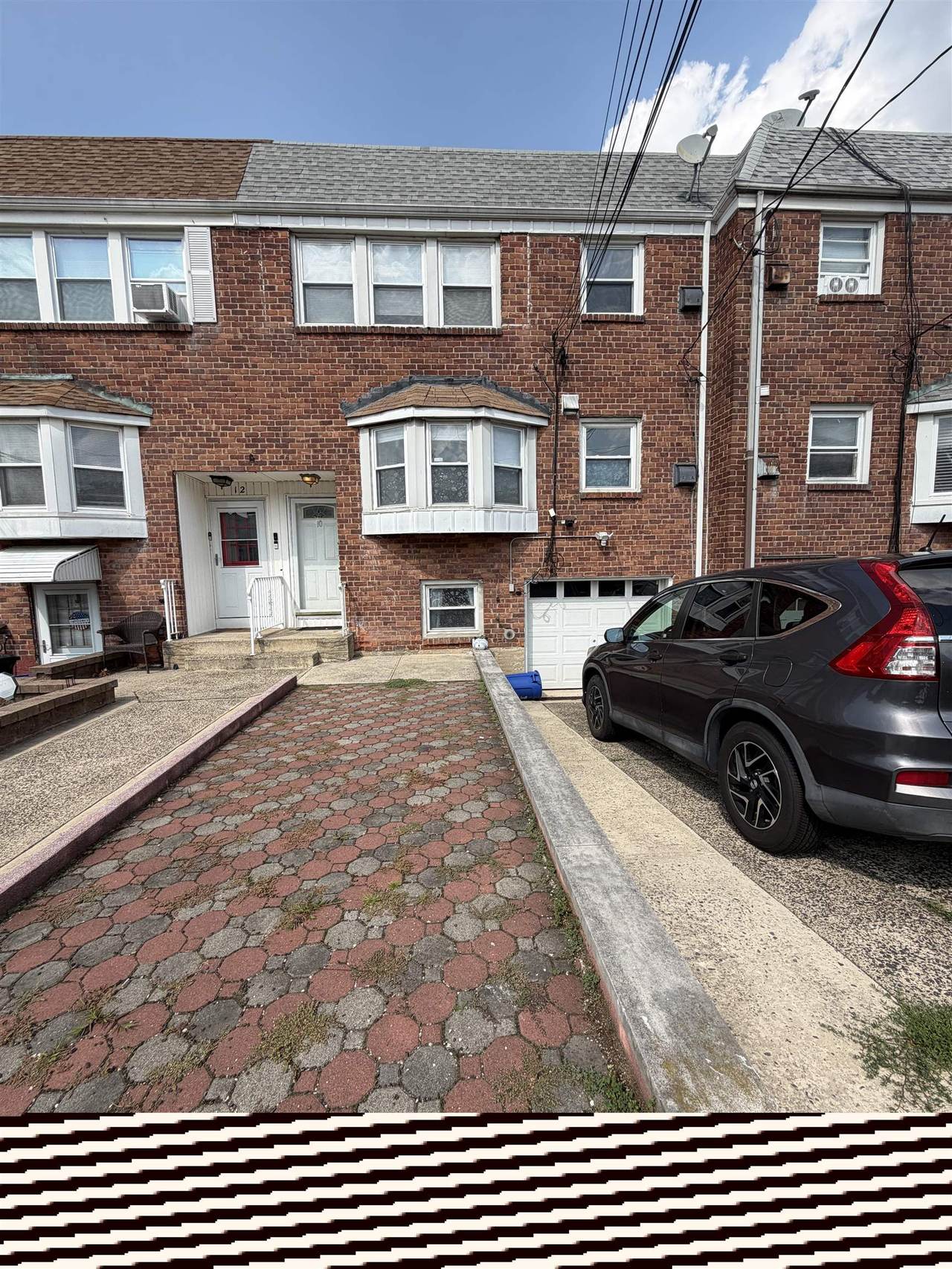 A Jersey City Heights rowhouse block, part of Team RUS's active service area