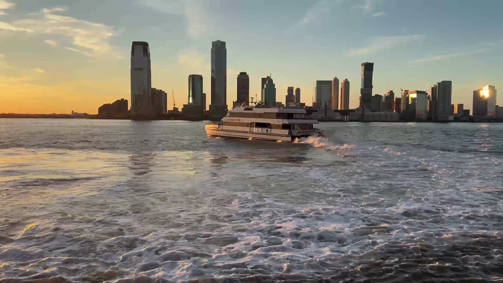 The Jersey City skyline at sunset from the Hudson River